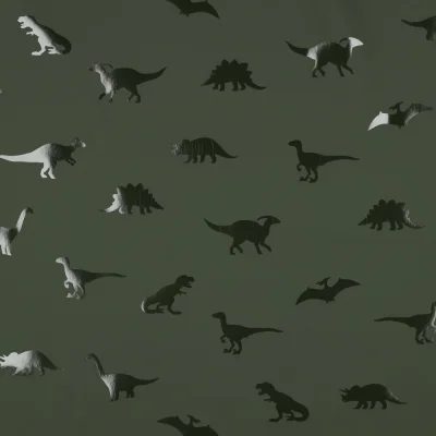 Tissu Imperméable dino brillant Timo sur fond Vert profond - Par 10 cm