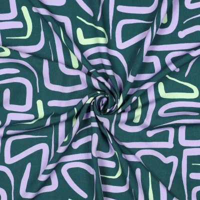 Tissu Viscose imprimé motifs abstraits Lila et Vert d&#039;eau sur fond Vert canard - Par 10 cm
