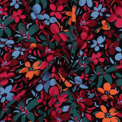 Tissu Viscose imprimé orchidées rouge et vert canard sur fond Noir - Par 10 cm