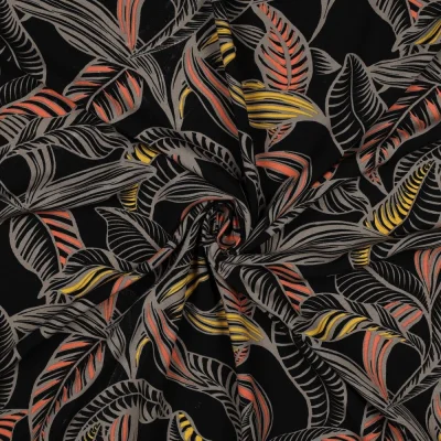 Tissu Viscose EcoVero feuilles Tropicales sur fond Noir profond - Par 10 cm