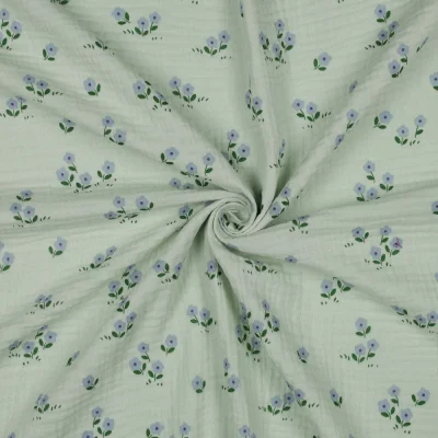 Tissu Double gaze de Coton petites fleurs sur fond Vert amande - Par 10 cm