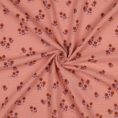 Tissu Double gaze de Coton petites fleurs sur fond Pêche - Par 10 cm