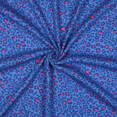 Tissu Jersey Coton côtelé Léopard Bleu nuit &amp; Rose pop sur fond Bleu roi - Par 10 cm