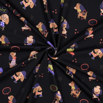 Tissu Jersey Coton imprimé digital Petits Chiens sur fond Noir - Par 10 cm