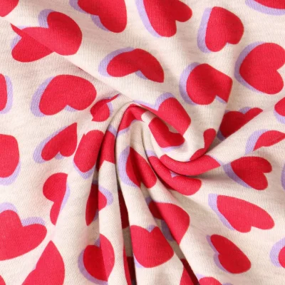 Tissu Sweat  léger envers molletonné Lisa coeurs Rouges sur fond Gris chiné - Par 10 cm
