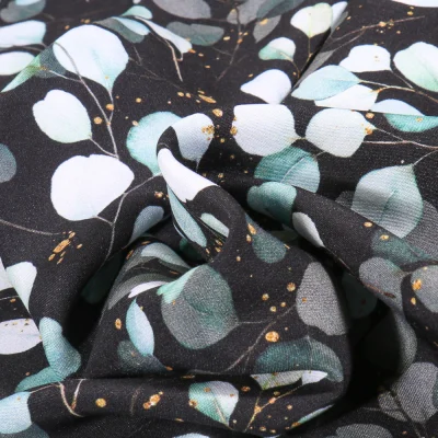 Tissu Viscose Aqua Eucalyptus sur fond Noir - Par 10 cm
