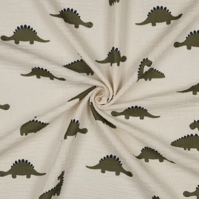 Tissu Double gaze de Coton Bio Dinosaures Vert kaki sur fond Ecru - Par 10 cm