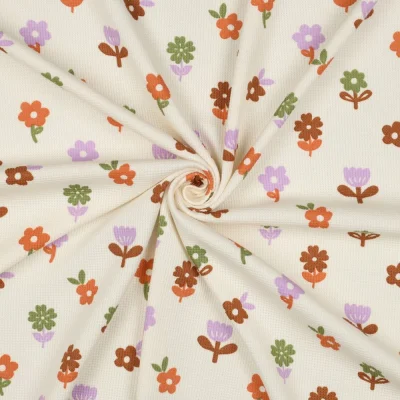 Tissu Jersey Nid d&#039;abeille imprimé Fleurs sur fond Ecru - Par 10 cm