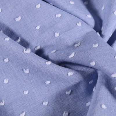 Tissu Plumetis léger  Pois blanc sur fond Bleu - Par 10 cm