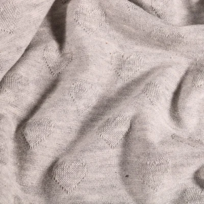 Tissu Jersey coton Cœurs 3D en relief sur fond Gris chiné - Par 10 cm