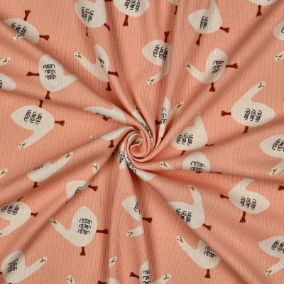 Tissu Jersey cotêlé Bio Jennifer Bouron oies sur fond Rose saumon - Par 10 cm