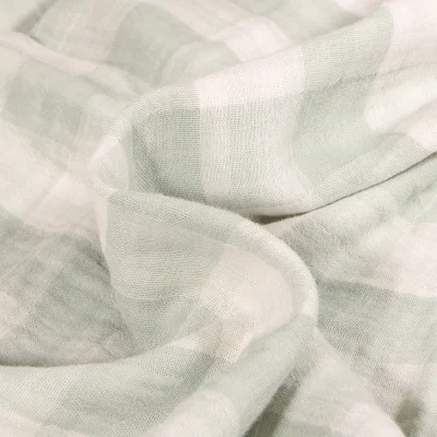 Tissu Double gaze reversible Vichy sur fond Vert pastel - Par 10 cm