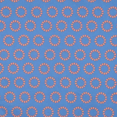 Tissu Polycoton  Rosace Pop orange sur fond Bleu lavande - Par 10 cm