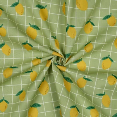 Tissu Coton enduit Poppy Citrons et carreaux sur fond Vert - Par 10 cm