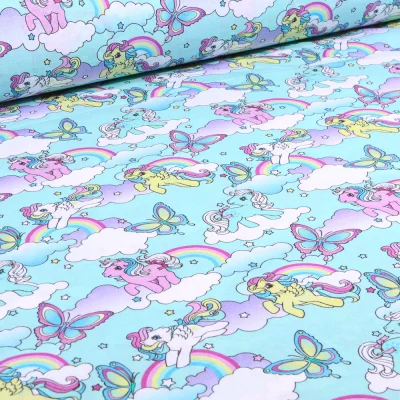 Tissu Coton imprimé sous licence My little Pony sur fond Bleu turquoise - Par 10 cm