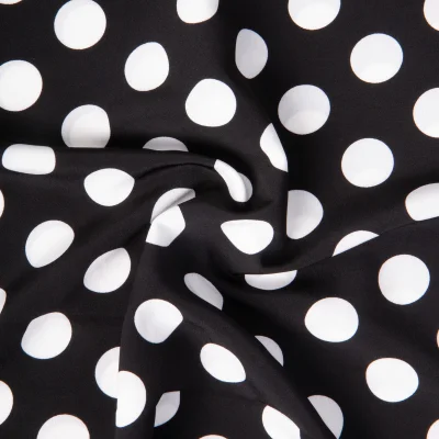 Tissu Crêpe léger Grand pois Blancs sur fond Noir - Par 10 cm