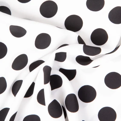 Tissu Crêpe léger Grand pois Noirs sur fond Blanc - Par 10 cm