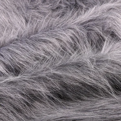 Tissu Fausse fourrure Fantasia sur fond Gris - Par 10 cm