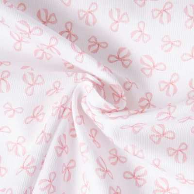 Tissu Pique de Coton  Nube Noeud sur fond Blanc - Par 10 cm