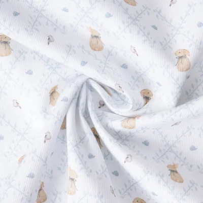Tissu Pique de Coton  Nube Panpan sur fond Blanc - Par 10 cm