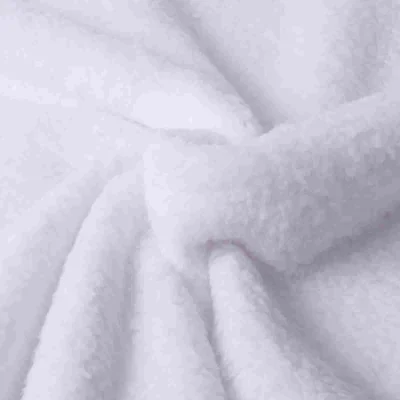 Tissu Fausse fourrure uni cloudy Blanc - Par 10 cm