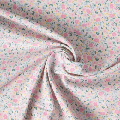 Tissu Coton imprimé Liberté floral rose bleu sur fond Blanc - Par 10 cm