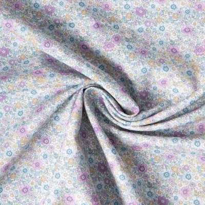 Tissu Coton imprimé Liberté floral  bleu violet sur fond Blanc - Par 10 cm