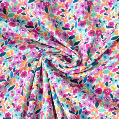 Tissu Jersey de Coton Nina pop sur fond Blanc - Par 10 cm