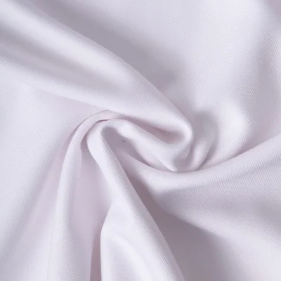 Tissu Sergé Polyviscose  Hispania sur fond Blanc - Par 10 cm
