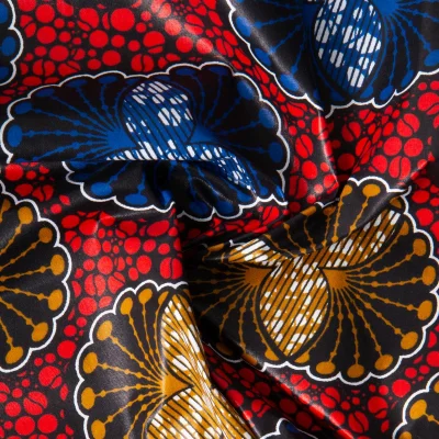 Tissu Wax africain n°607 sur fond Rouge - Par 10 cm