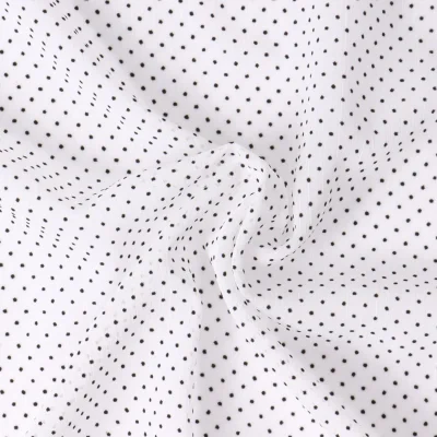 Tissu Mousseline  texturé Mini pois sur fond Blanc - Par 10 cm