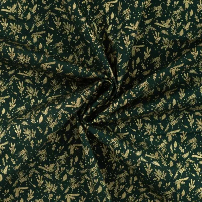 Tissu Coton imprimé motifs de Noël dorés sur fond Vert sapin - Par 10 cm