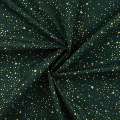 Tissu Popeline de Coton Santa nuit étoilé Dorée sur fond Vert sapin - Par 10 cm
