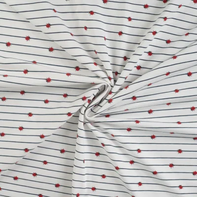 Tissu Jersey Coton Rayures bleues et coccinelles sur fond Blanc - Par 10 cm