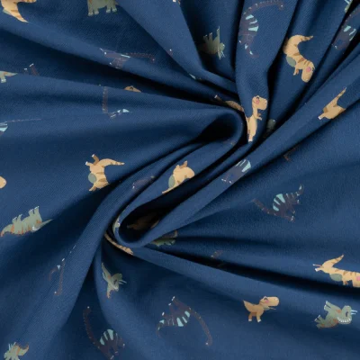 Tissu Jersey Coton imprimé Noé gentils dinosaures sur fond Bleu marine - Par 10 cm