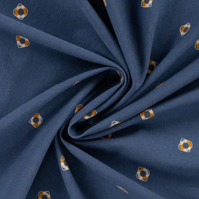Tissu Jersey Coton imprimé Oscar bouées flottantes sur fond Bleu marine - Par 10 cm