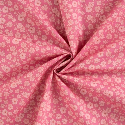 Tissu Coton imprimé Fleurs Mia sur fond Rose - Par 10 cm