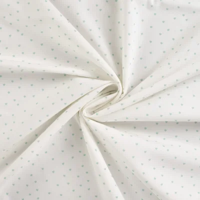 Tissu Coton imprimé Petits coeurs bleus sur fond Blanc - Par 10 cm