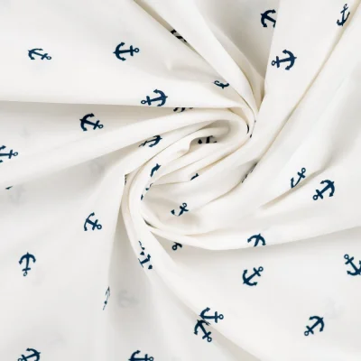 Tissu Coton imprimé Ancres bleues sur fond Blanc cassé - Par 10 cm