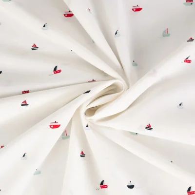 Tissu Coton imprimé Bateaux sur fond Blanc cassé - Par 10 cm