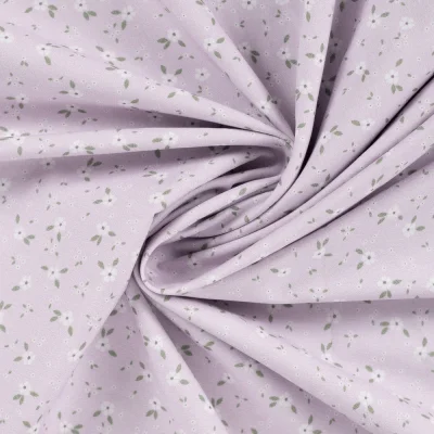 Tissu Popeline de Coton Charlotte petites fleurs sur fond Lilas - Par 10 cm