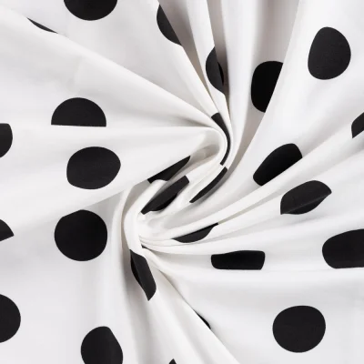 Tissu Sweat léger envers gratté pois Noir sur fond Blanc - Par 10 cm