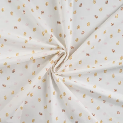 Tissu Jersey Coton Feuilles pailletées sur fond Blanc - Par 10 cm