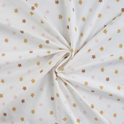 Tissu Jersey Coton Fleurs roses, taupes et or pailleté sur fond Blanc - Par 10 cm