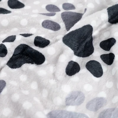 Tissu Doudou imprimé Pattes d’animaux sur fond Gris clair - Par 10 cm