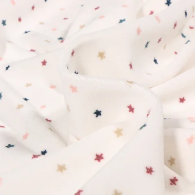 Coupon Tissu Jersey Velours tout doux Etoiles multicolores sur fond Blanc cassé - Coupon de 20 cm