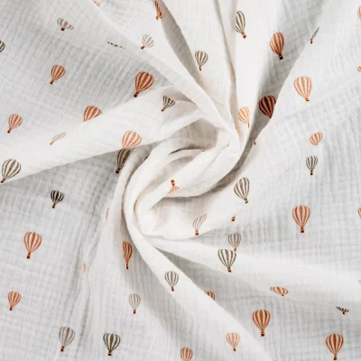 Tissu Double gaze de Coton Montgolfières sur fond Blanc cassé - Par 10 cm