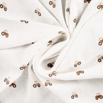 Tissu Double gaze de Coton Tracteurs sur fond Blanc cassé - Par 10 cm