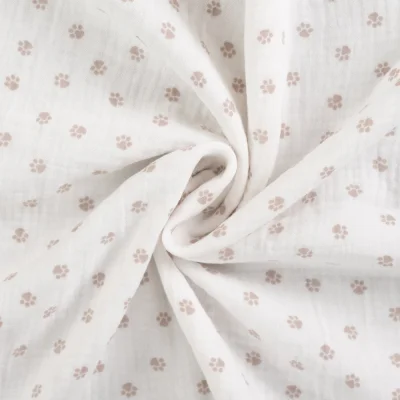 Tissu Double gaze de Coton Pattes de chien sur fond Blanc cassé - Par 10 cm