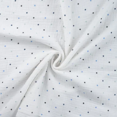 Tissu Double gaze de Coton Petits pois bleus sur fond Blanc - Par 10 cm